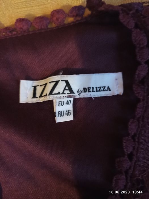 Отдам за бутылку масла.Женское платье , джемпер46размер