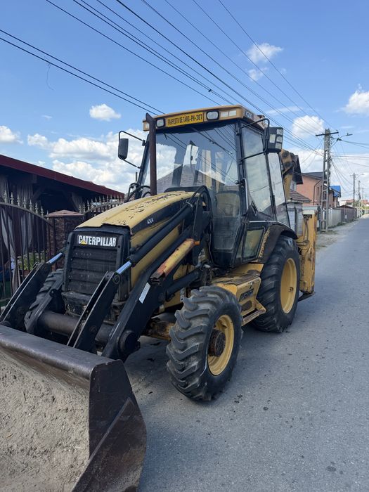 Buldoexcavator Cat 428C 2002