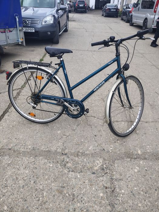 Bicicleta dama Hercules cu dublu schimbator spate. Roti pe 28.