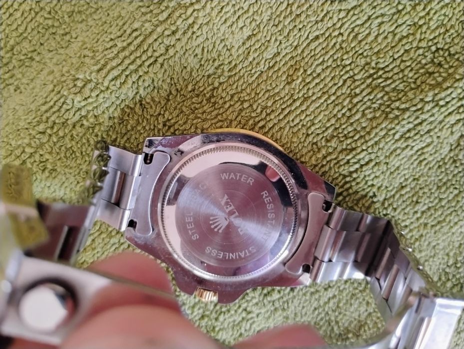 Ролекс м. часовник и м.гривна Версаче