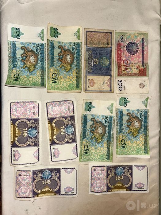 Купюры наминалом 500,200,100,25 сум