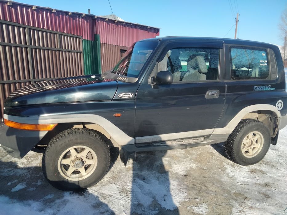 Автомобиль Санг Енг Корандо