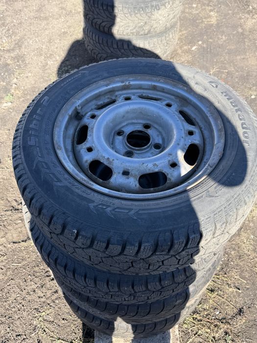 Продам шины с дисками 185/65R14