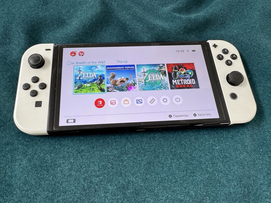 nintendo switch oled + 4 игры