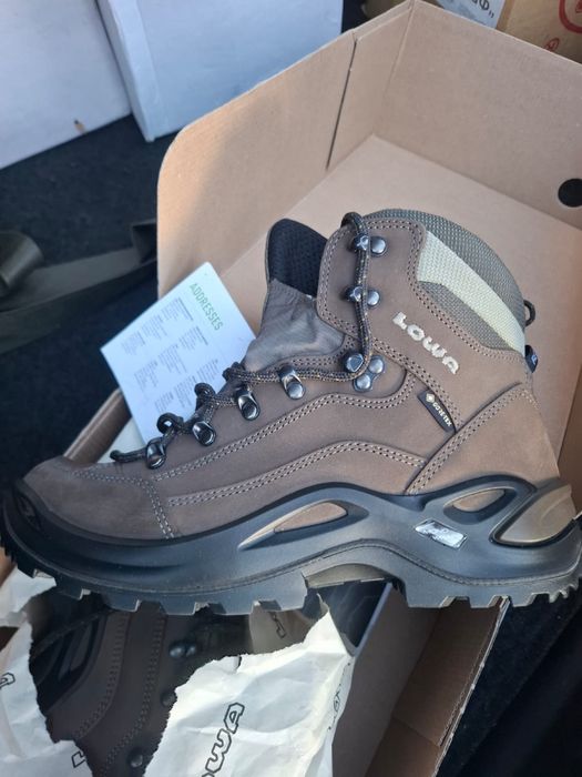 Продам новые сапоги