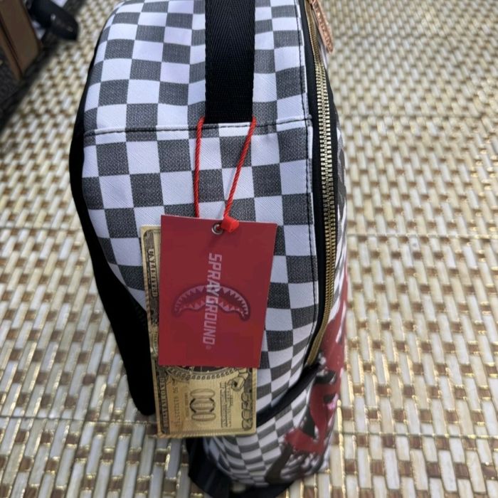 Портфели sprayground