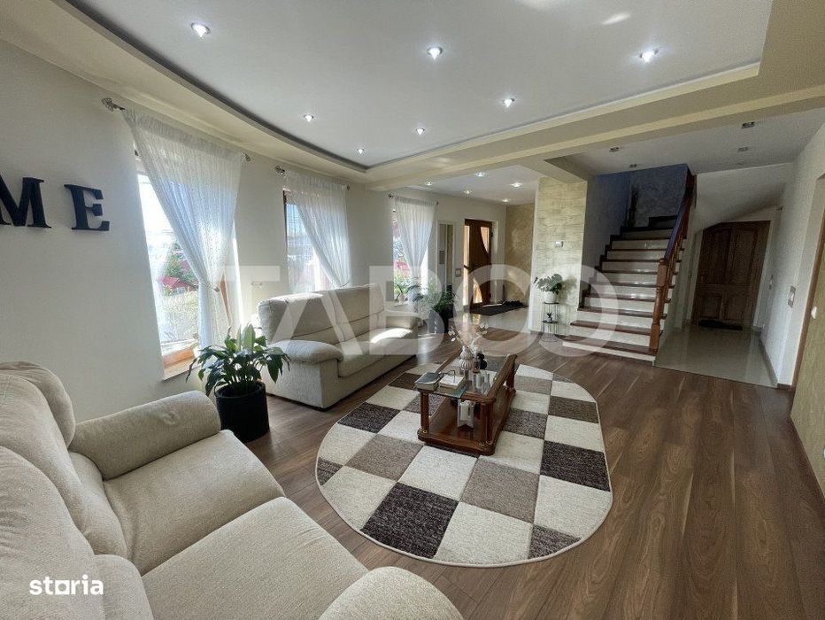 Casa individuala 4 camere 135 mpu garaj pivnita teren 588 mp Sura Mare
