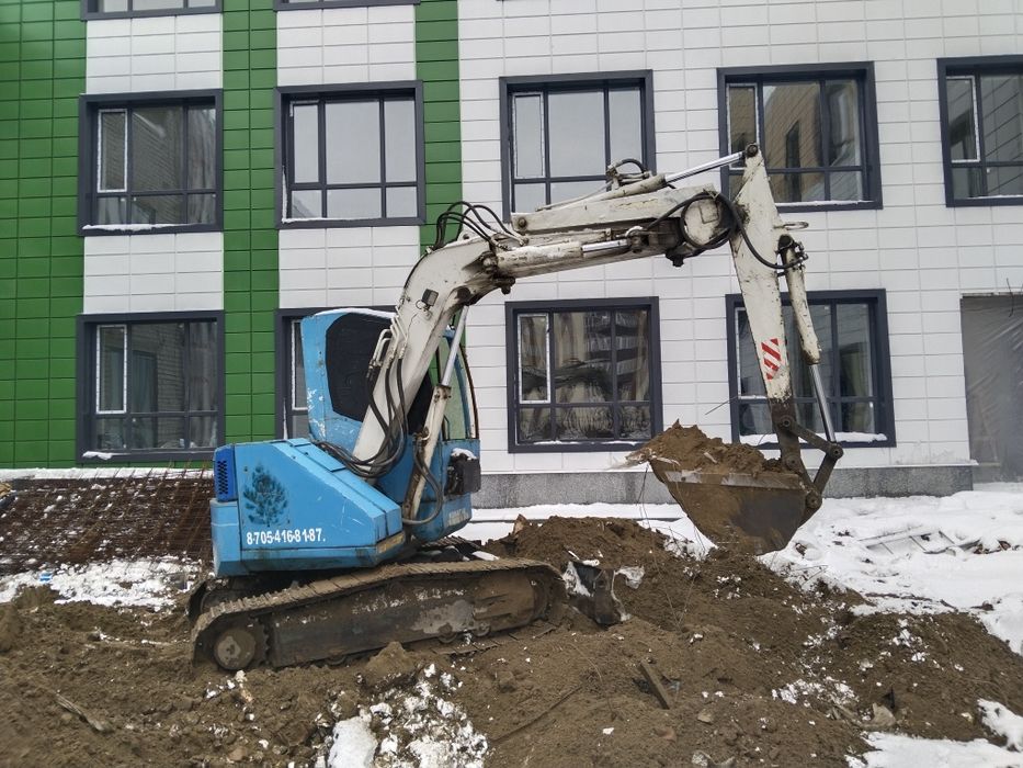Услуги мини экскаватора водопровод септик под ключ  кабель