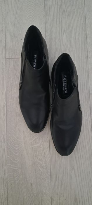 Продам новые кожанные ботинки