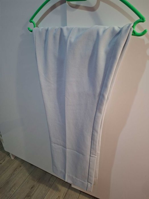 Панталон в цвят светло синьо, размер XL