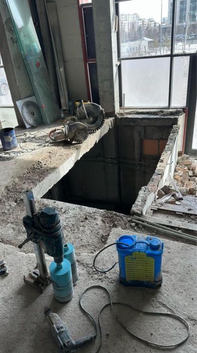 Демонтаж стены в Астане