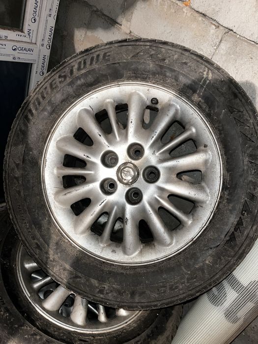 Set 4 jante aliaj originale + anvelope Bridgestone