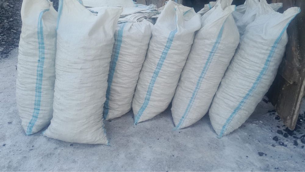 Уголь дрова в мешках