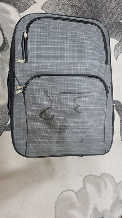 Чемодан на колёсиках