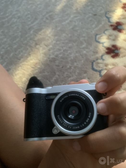 fotoaparat  512 tali xotira fleshkasi bilanbirga