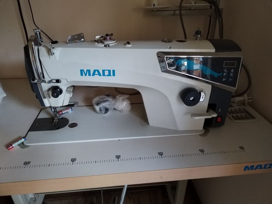 tikyv mashinasi MAQI bir chok yangidek  holatda