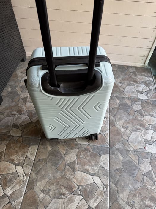 Troler /valiza bagaj in avion  de mana