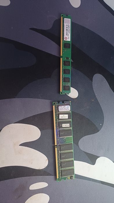 Процесор intel E 6500. Ram 2GB ,512 MB