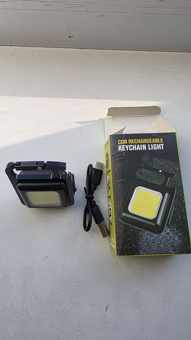 Фонарь брелок новый.