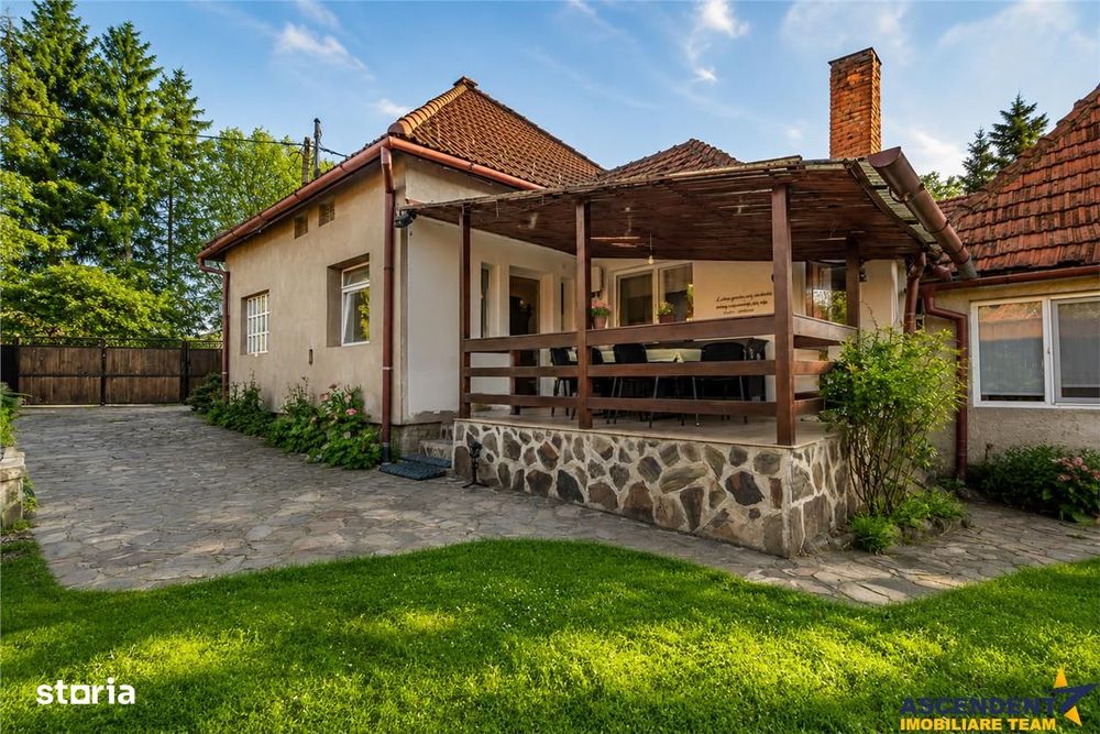 Casa familiala cu: teren 2.822 mp intravilan, sauna,  atelier, terasa,