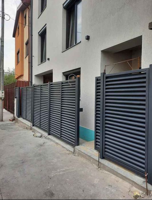 Garduri si porti stil jaluzea plasa bordurata sipca metalica fier forjat tabla cutata si alte modele.