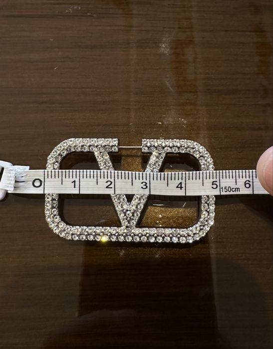 Brosa V inscriptionata