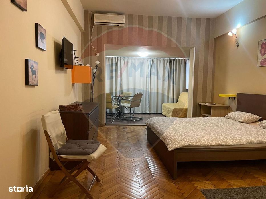 Garsonieră spațioasă - Piața Romană, vedere spre ASE, disponibila acum