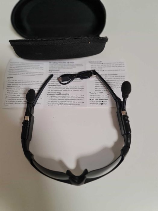Ochelari de soare cu căști audio prin Bluetooth si toc