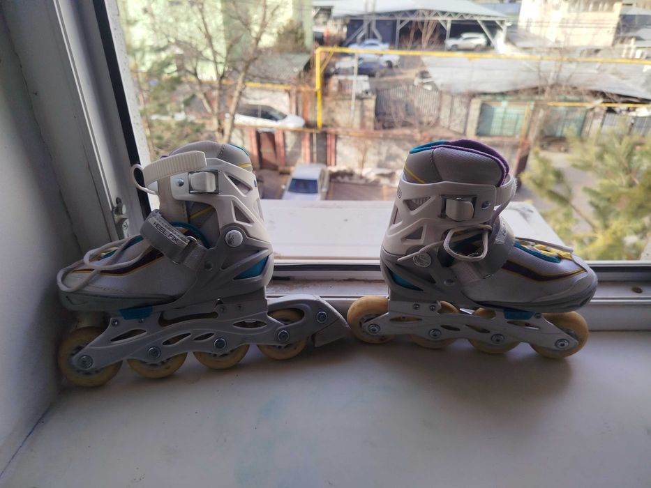 Продам роликовые коньки б/у