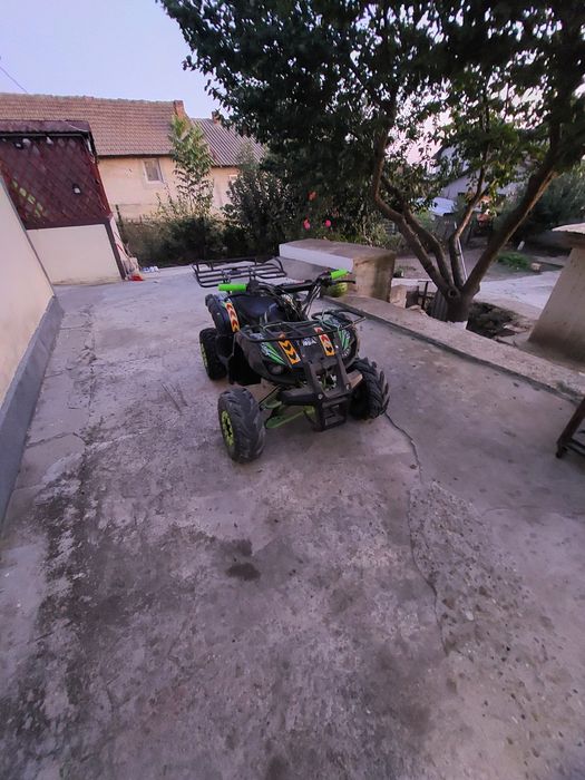 Vând atv 125 centimetri cubi