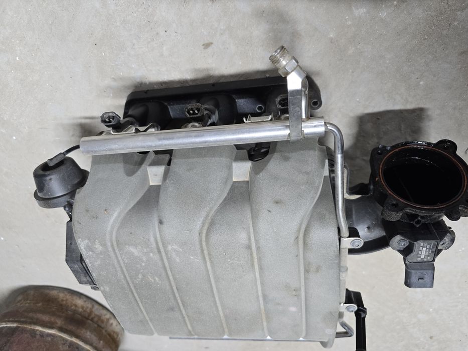 Коллектор на ауди а6 с6