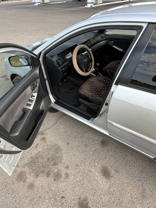 Тойота каролла 2003