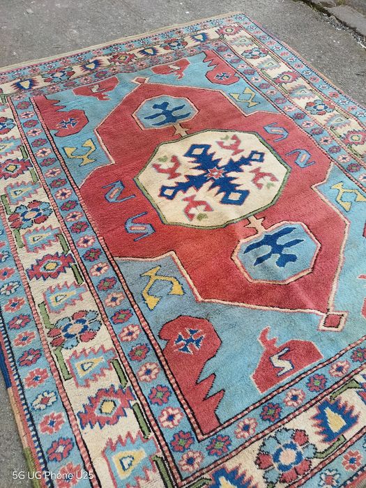 Ръчно тъкан килим