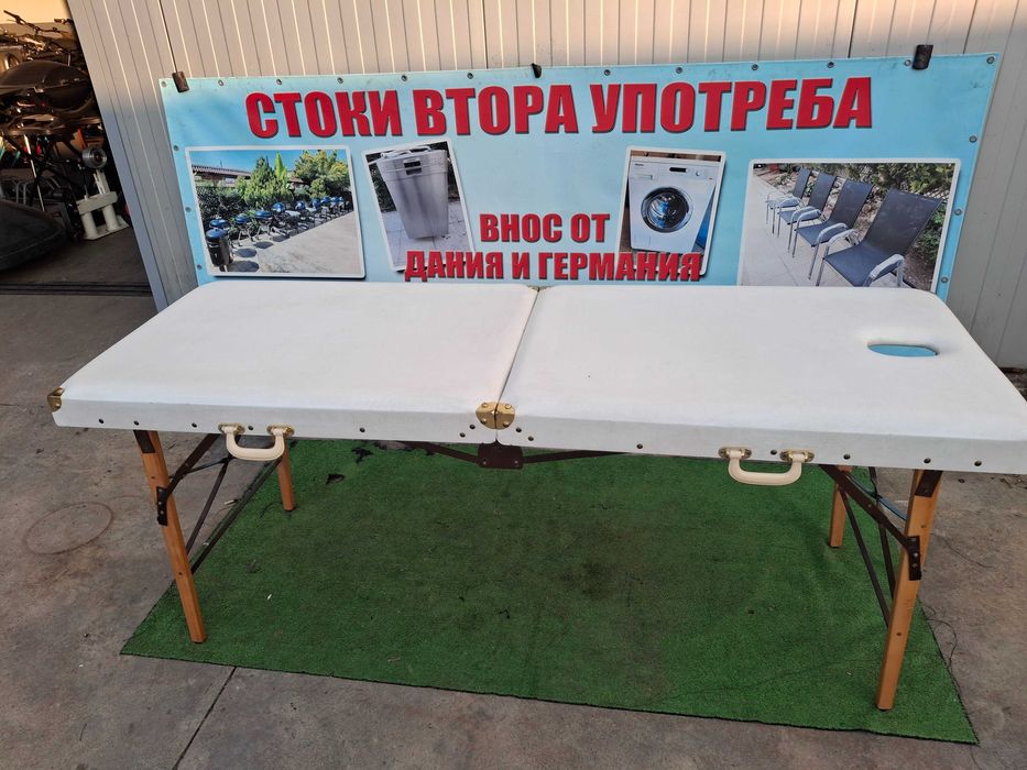 Масажна кушетка ..