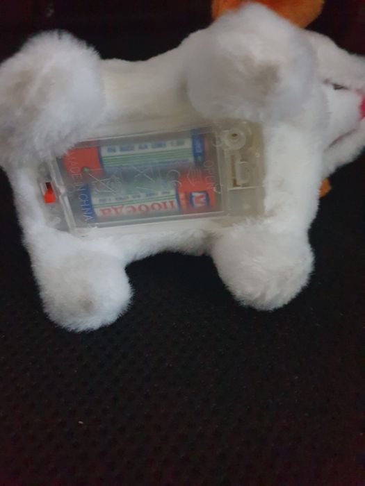 Автомобильная кукла собачка такса.