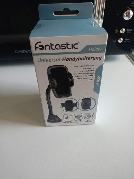 Vând suport auto universal pentru telefon, gps.
