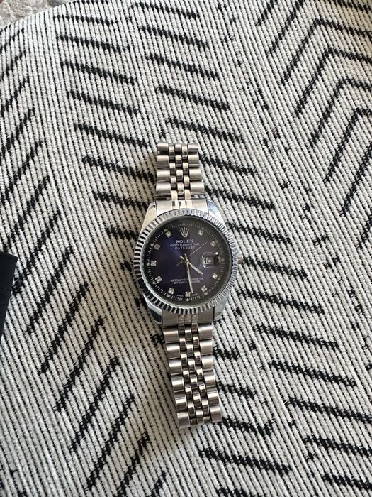 Мужские часы Rolex.