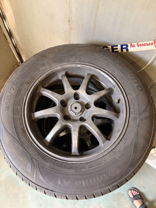 Продам шины с дисками 215/70R16