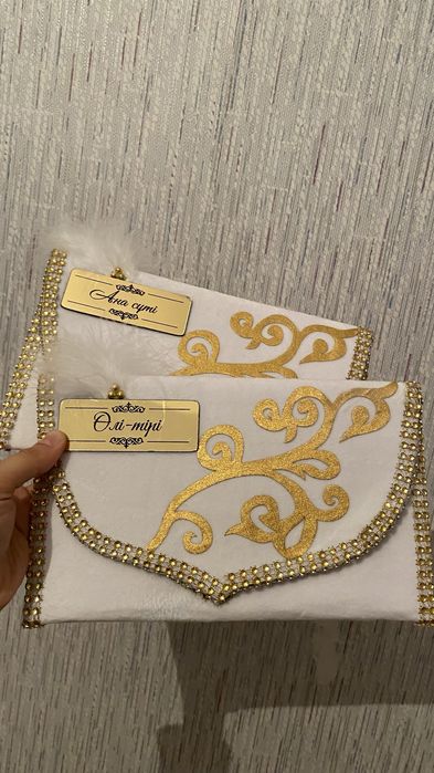 Ана сүті, Өлі тірі, ақша салуға арналған конверт