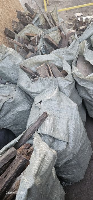 Готовые дрова в мешках