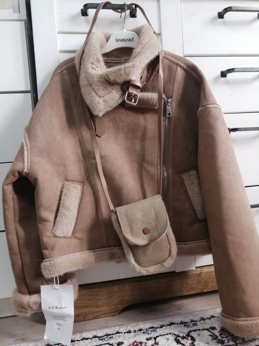 Новая дубленка...