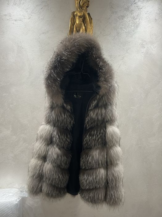 Vesta blana vulpe