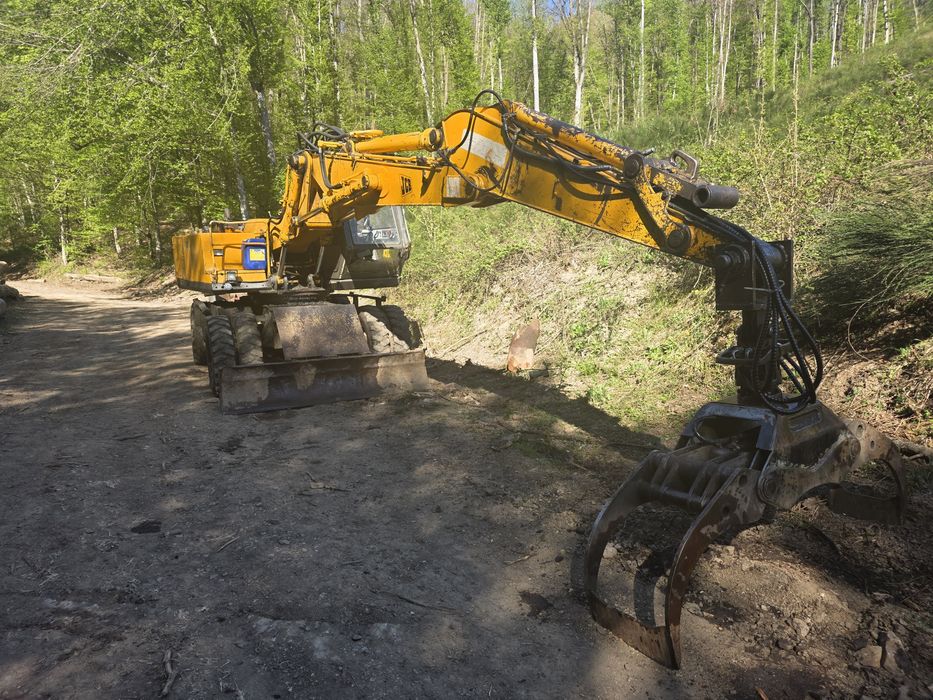 Excavator 15 tone JCB JS130W pe roti webasto