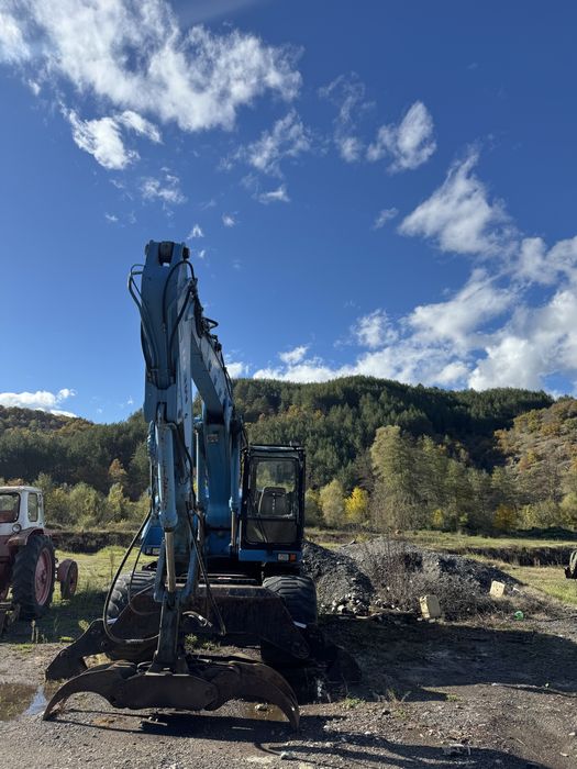 Колесен багер Atlas