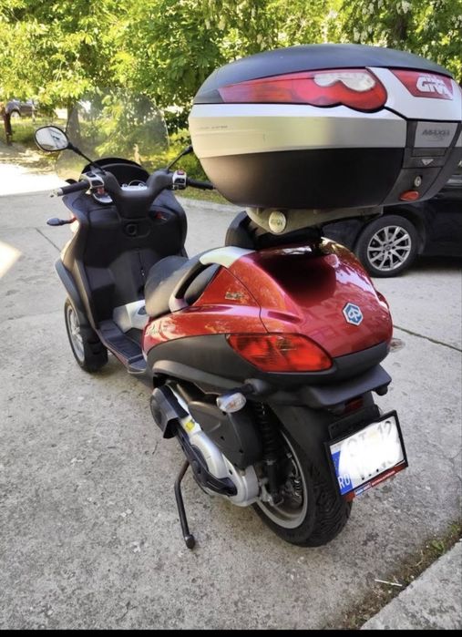 Piaggio mp3 400cc lt se conduce cu B