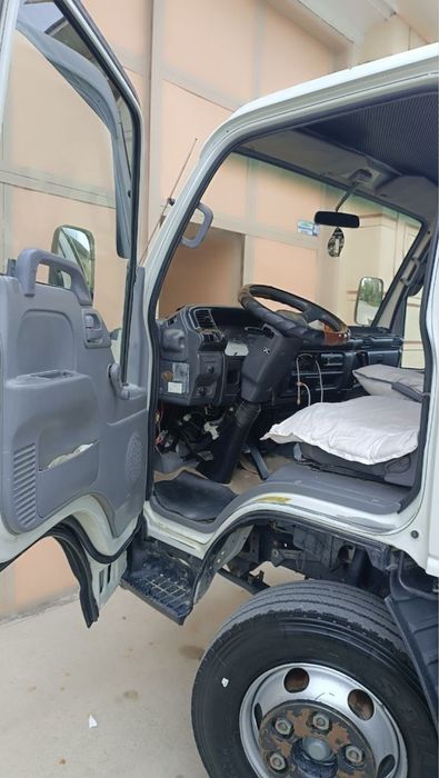 Isuzu NQR holati yaxshi ishlan turgan moshin balonlari 80% harajati yu