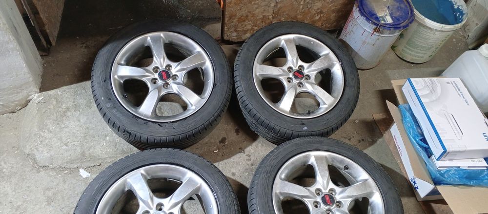 Продам диски с резиной летней Субару