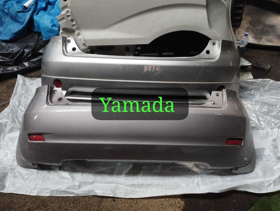 Nissan Note передний бампер оригинал задний