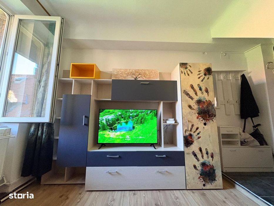 Garsoniera renovata-Piata Lahovari/Romana/ASE-curte privata,acces auto