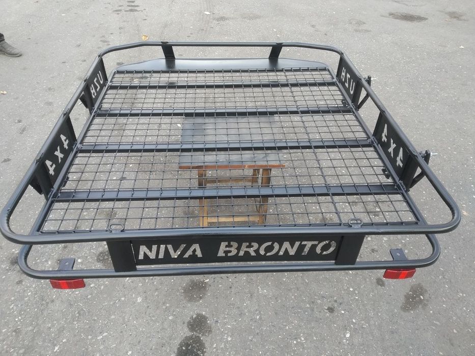 Багажник мошинани томига нивага